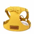 Pettorina per cani in camoscio giallo con grazioso fiocco e anelli metallici per cuccioli. - Taglia XXS (Pettorina) / Giallo