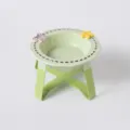 Elevated ceramic pet cat bowl with raised green metal stand, cute bow and star design SKU. - Dashed Bowl with Iron Stand / Green