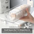 Clear acrylic makeup puff storage box set with 13 small portable cases for desktop organization. - Organizer Set (13 Small + 1 Long) / Clear