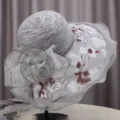 Detail view of elegant grey lace sun hat with large floral brim and organza decoration. - M (55-58cm) / Wide Brim Rose Style / Gray