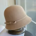 Exquisite beige wool felt cloche hat detail, featuring a side bow and retro Hepburn style. - Adjustable / Camel