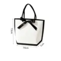 Sac-cadeau en papier blanc avec nœud ruban noir, emballage de shopping élégant. - Sac à Main Blanc avec Bord Noir / 14x7x13cm / Blanc