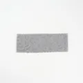 Grey lace hair band detail, showing the delicate floral pattern and stretchy wavy edge design. - Gray