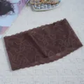 Detailed close-up of the vintage brown lace headband with elegant floral paisley pattern design. - Coffee