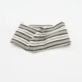 Close-up of a multi-color striped knitted headband featuring a stylish twisted design detail. - Black