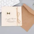 Tarjeta de felicitación vintage con colgante de lazo de metal y sobre kraft para regalos. - Lazo (319#蝴蝶结)