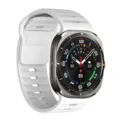 Close-up detail of white silicone smartwatch replacement strap with rugged case texture. - White