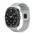 Detailed view of the smartwatch with perforated silicone strap and titanium-colored cushion case. - Galaxy Watch Ultra 2/1 / Yellow