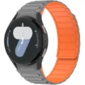 Close-up detail of magnetic silicone watch strap in grey and orange, flexible and durable. - Samsung Watch 7/6/5/4 / Gray and Orange