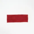 Close-up detailed view of red knitted elastic wide headband featuring elegant rose pattern. - Rose Red