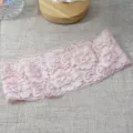 Pink wide lace floral headband detail shot, elegant stretchy hollow hair accessory for women. - Pink