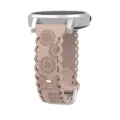 Detailed view of 20mm silicone watch strap featuring engraved sunflower pattern and scalloped edges. - 20mm / Milk Tea