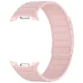 Close-up detail of the pink magnetic silicone watch strap featuring segmented design and connectors. - Samsung Watch 8 / Pink Sand