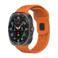 Orange perforated silicone watch strap compatible with smartwatches, breathable sport band. - Orange