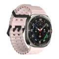 Pink perforated silicone watch strap detail, breathable multi-hole replacement band for smart watch. - Silver Clasp / Nebula Pink