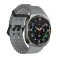 Silicone breathable strap detail closeup, porous design, comfortable daily wear replacement. - Silver Clasp / Brownish Gray