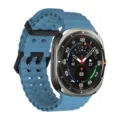 Close-up detail of the breathable blue silicone watch strap with double black buckles. - Silver Clasp / Premium Blue