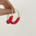 Detail view of trendy Korean style red crystal beaded gold hoop earrings for women. - Crystal Red