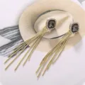 Elegante lange goldene Quasten Ohrringe mit quadratischen Strasssteinen fuer Damen Schmuck. - Grau