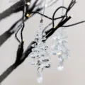 Detailed close-up view of a clear faceted crystal Christmas tree hanging pendant for home decor. - Crystal Christmas Tree with Star