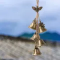 Bronze vintage wind chime hanging bell with hemp rope, moon sun butterfly charms for home decor. - Hemp Rope Skeleton Butterfly