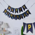 Bannière joyeux anniversaire papier bleu dorure queue d'aronde accessoires de fête. - Banderole noire avec dorure à l'anglaise