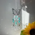 Butterfly crystal prism pendant for home, car, garden, patio, and window hanging decor. - Navy Blue