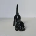 Detailed view of a cute black resin dachshund figurine, perfect for home decor and tabletop. - Ring Dog - Black