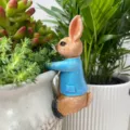 Resin rabbit pot hanger figurine, cute Peter Rabbit style garden plant decoration for Easter. - Blue Bunny