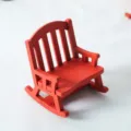Miniature red wooden rocking chair detail shot for 1:12 dollhouse and festive decor. - Red