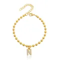 Bracciale di perle dorate con ciondolo lettera N, gioiello da polso in acciaio inossidabile. - Braccialetto a Sfere Iniziale N con Strass / Argento
