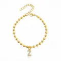 Bracciale di perle in acciaio inossidabile dorato con ciondolo lettera Z pavé di zirconi donna. - Braccialetto a Sfere Iniziale Z con Strass / Oro