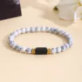 White Howlite Beaded Bracelet with Black Center Stone and Gold Spacers Fashion Detail - 6mm / White Turquoise Tourmaline Bracelet