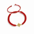 Red braided cord bracelet with a gold-colored stainless steel witch knot pendant detail shot. - Style B / Gold-Red