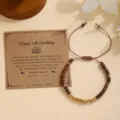 Pulsera de cumpleaños Morse de piedra natural con cuentas de acero y tarjeta de regalo. - Pulsera 35 de Cumpleaños con Código Morse Dorado / Con Tarjeta