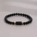 Close up of black obsidian beaded bracelet with gold spacers and matte center stone detail. - Tourmaline Natural Obsidian Beaded Bracelet / 6MM/1 Piece