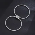Stainless steel spring couple bracelets set, silver tone matching love engraved detail jewelry gift. - 1 Pair LOVE Heart Pattern Spring Bracelets / Silver