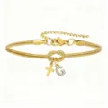 Bracciale in oro a catena di serpente con nodo, croce e ciondolo con lettera G brillante. - Bracciale Nodo Concentrico Croce Strass Stile G / Oro