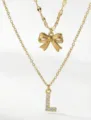 Collana multistrato dorata con fiocco e lettera L in strass, elegante catenina da clavicola. - Set da 2 pezzi - Stile Fiocco Lettera L / Oro