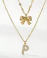 Collana a doppia fila dorata con ciondolo a fiocco e lettera P in strass da donna. - Set da 2 pezzi - Stile Fiocco Lettera P / Oro