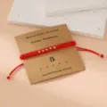 Red woven Morse code number 5 bracelet with gold beads handmade friendship jewelry item - Morse Code 5 Red Flat Knot Cord Bracelet with Card