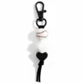 Close-up detail of sports baseball keychain pendant with silicone beads and black tassel. - Baseball