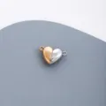 Stainless steel two-tone heart magnetic DIY jewelry connector accessory detail shot. - Silver And Rose Gold