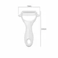 White ceramic fruit peeler kitchen tool with ergonomic handle, sharp blade, 12.6cm length. - Peeler / White
