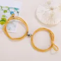 Magnetic matching heart couple bracelets made of yellow braided rope for lovers and friends. - Elastic Heart Magnet Style / 1 Pair / Turmeric