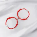 Stainless steel sun and moon magnetic couple red rope bracelet detail view, elegant pair jewelry. - Sun & Moon / 2-Piece Set / Red