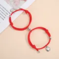 Red braided magnetic couple bracelets with metal smiley face charms for sweet daily wear. - One Pair / Red