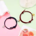 Magnetic couple bracelet featuring braided rope design and alloy winged heart lock charm. - Magnetic Heart Pair / 1 Pair / Dark Blue and Wine Red