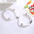 Pulsera de pareja corazón magnético cuerda trenzada blanca detalle, dijes de acero inoxidable. - Corazón Blanco / Un par