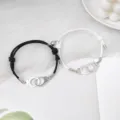 Couple magnetic handcuff matching bracelets set in black and white rope for lovers. - Handcuff Black and White Pair